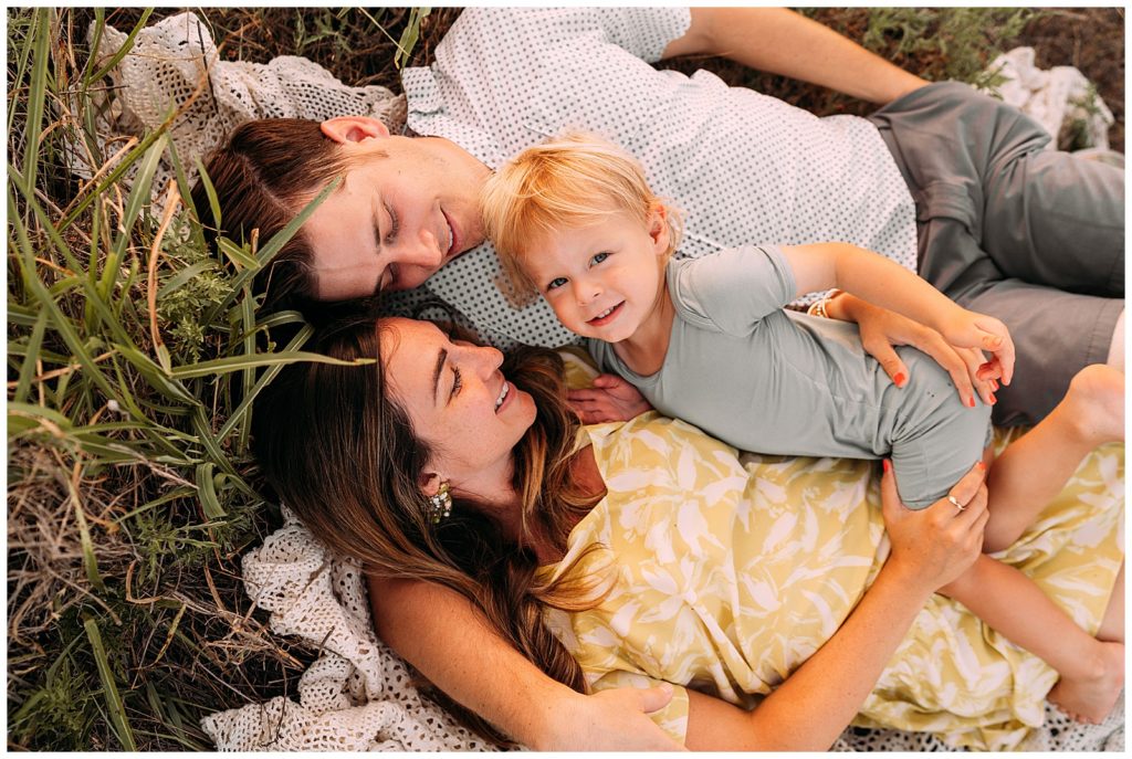 family snuggles during summer photography session
