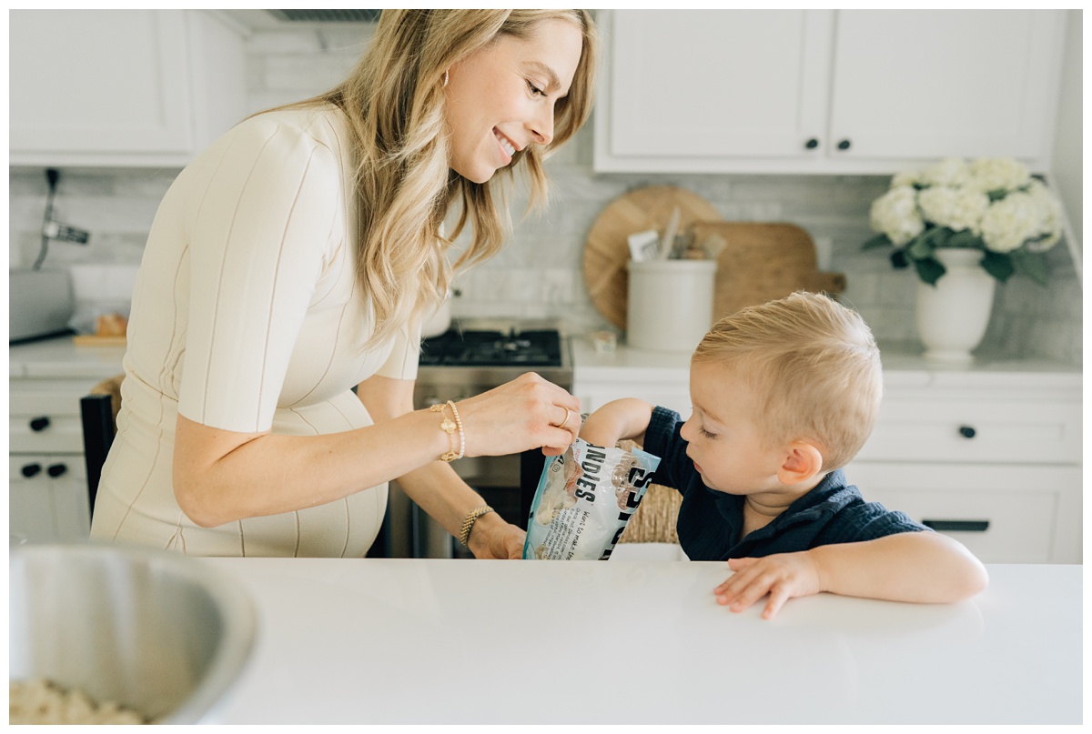 photographer captures family baking in kitchen