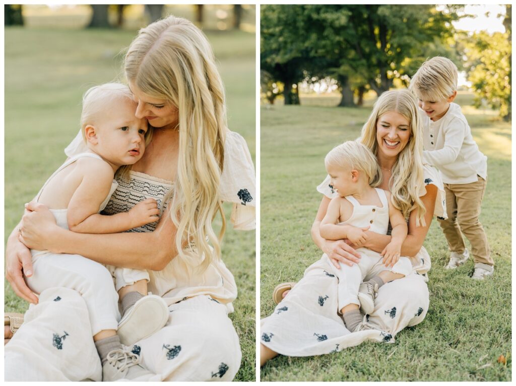 toddler snuggling in mom's lap while older brother plays with mom's hair in OKC photo session 