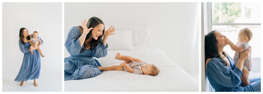 mother and baby girl playing in indoor white studio for photo session 