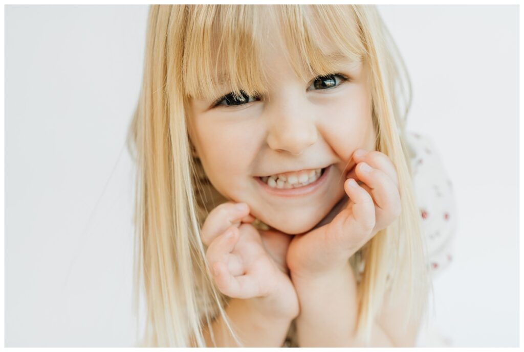 school portrait of girl with white background