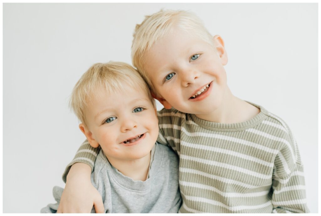 brothers posing for preschool school portraits 