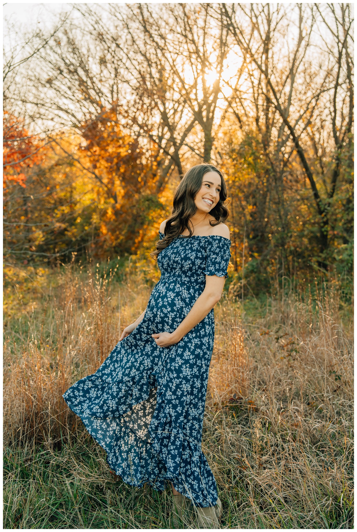 maternity session in a field in golden hour with Haley Kinzie Photography