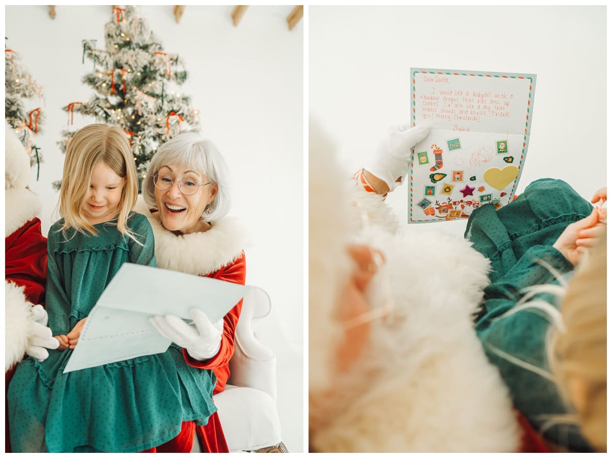 Mrs. Claus reads a letter to Santa with a smiling child, holding decorated stationery in a cozy Christmas scene.